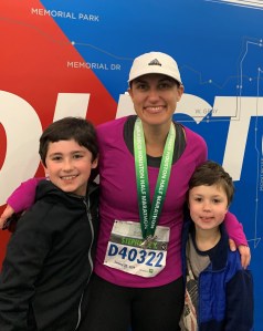 Celebrating the completion of a half marathon with her two boys!